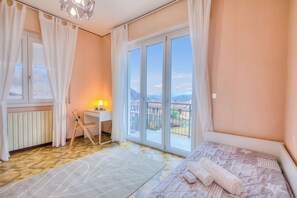 Family Apartment, Multiple Bedrooms, Mountainside (Zio Enry Terrace Apartment Orta Lake) | 3 bedrooms, laptop workspace, free WiFi, bed sheets