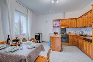 Family Apartment, Multiple Bedrooms, Mountainside (Zio Enry Terrace Apartment Orta Lake) | Private kitchen | Fridge, microwave, oven, stovetop - Zio Enry Terrace Apartment Orta Lake (Armeno)