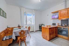 Family Apartment, Multiple Bedrooms, Mountainside (Zio Enry Terrace Apartment Orta Lake) | Private kitchen | Fridge, microwave, oven, stovetop - Zio Enry Terrace Apartment Orta Lake (Armeno)