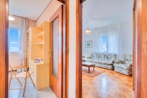 Family Apartment, 3 Bedrooms, Balcony, Mountainside (Zio Enry Terrace Apartment Orta Lake) | Living area | Flat-screen TV - Zio Enry Terrace Apartment Orta Lake (Armeno)