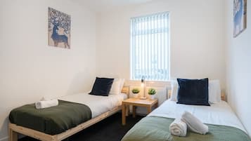 2 dormitorios, tabla de planchar con plancha, wifi y ropa de cama