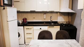 Family House | Private kitchen | Fridge, electric kettle