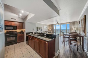 Fridge, microwave, oven, stovetop - 12th Floor 1BR + Bunks at Emerald Beach: Central Location, Breathtaking Views (Panama City Beach)