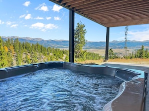 A hot tub with a view of mountains and trees. - Mountain Vista 3 Bedroom Chalet by RedAwning (Tabernash)