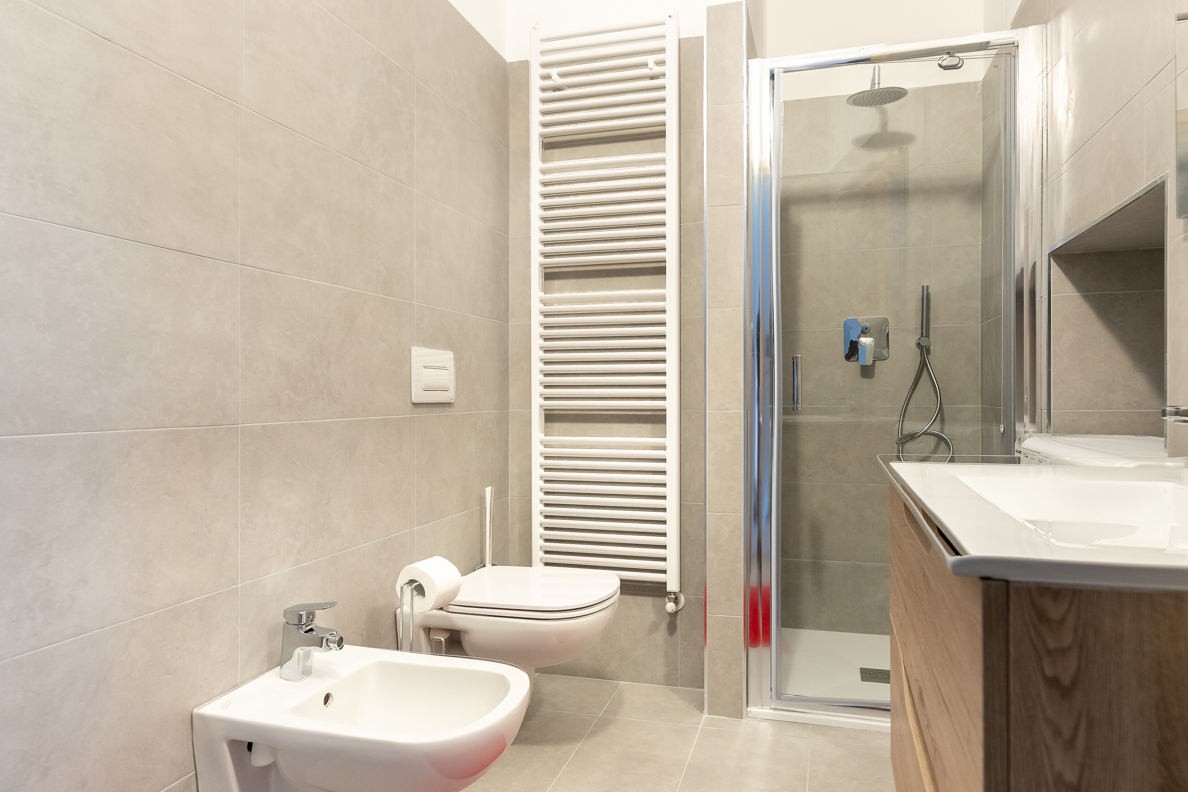 Comfort Apartment | Bathroom | Shower, rainfall showerhead, hair dryer, bidet