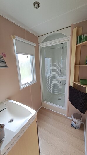 Douche, sèche-cheveux