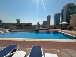 Outdoor pool - Lux BnB I Una Tower I Lakes View (Dubai)