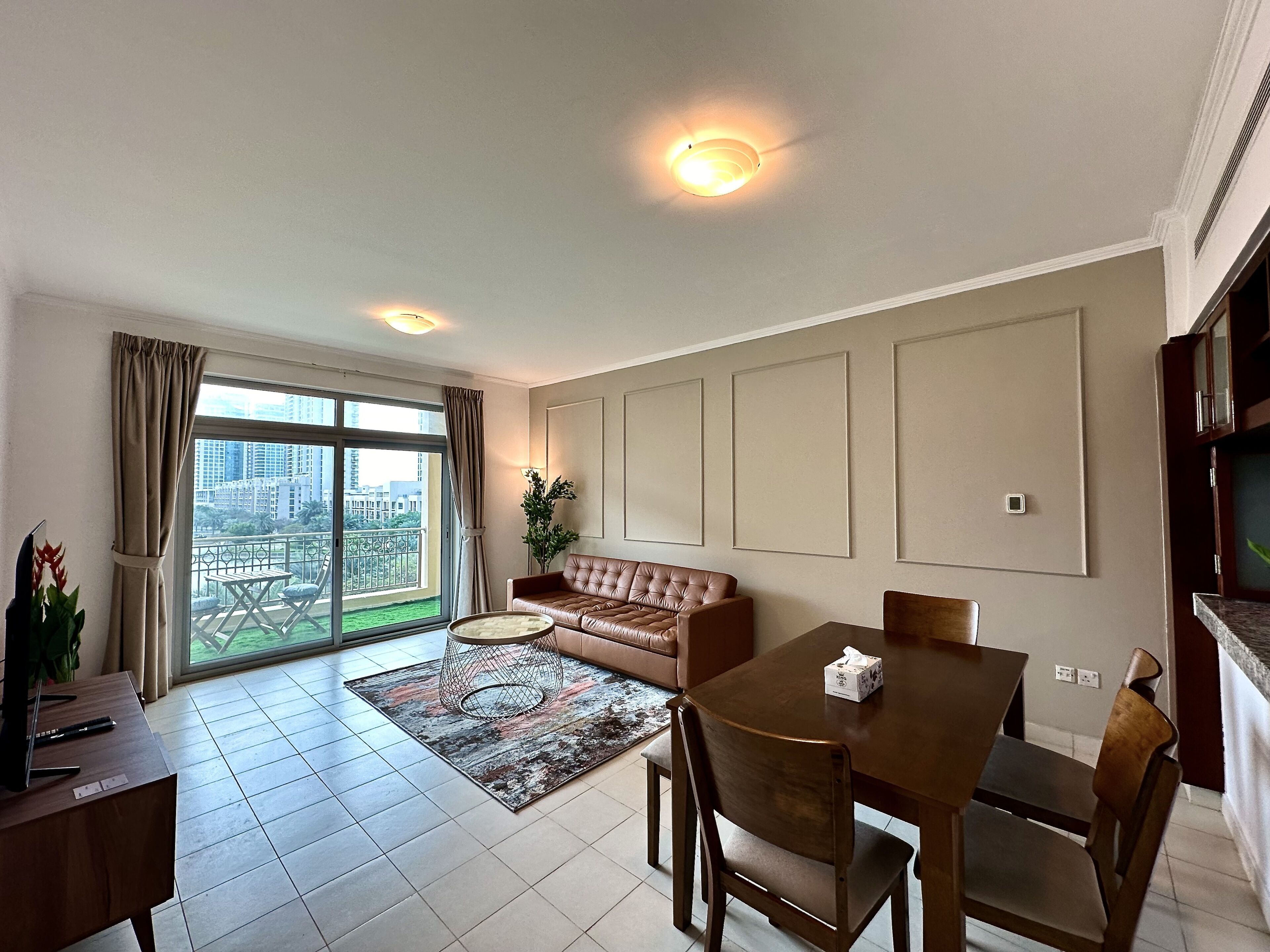 Panoramic Apartment | Living area | 60-inch Smart TV with digital channels, Netflix, streaming services