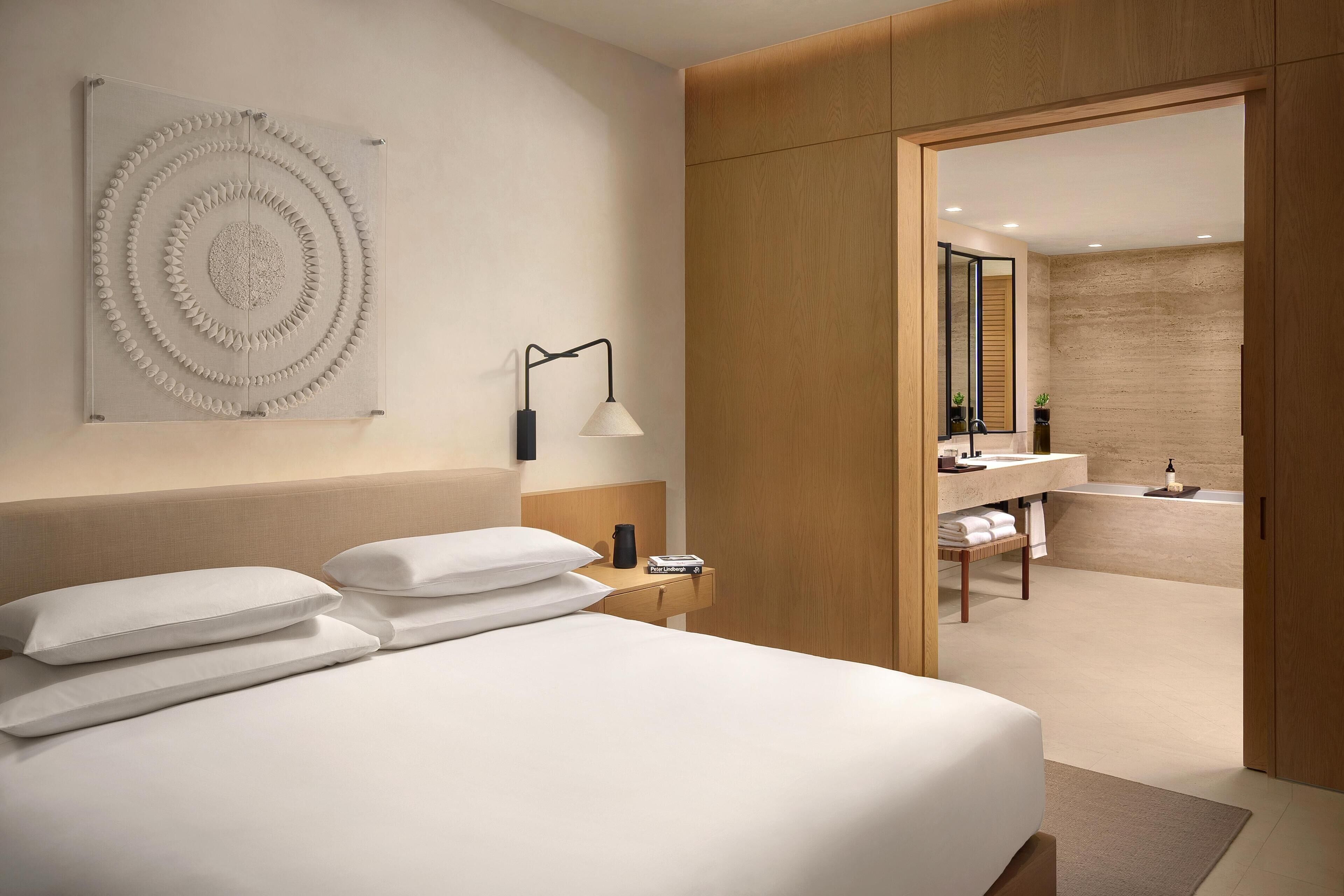 Premium bedding, down comforters, pillowtop beds, free minibar items