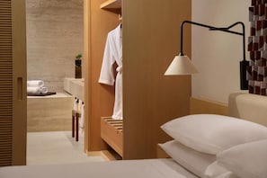 Premium bedding, down comforters, pillowtop beds, free minibar items