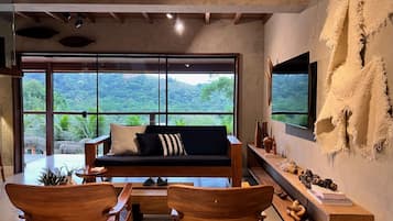 Casa com piscina e praia privativa | Sala de estar