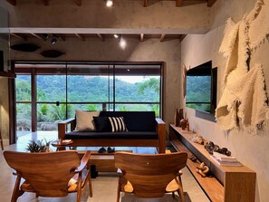 Casa com piscina e praia privativa | Sala de estar