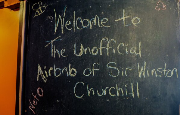 A blackboard with the text "Welcome to The Unofficial Airborne of Sir Winston Churchill." - ☆The Unofficial B&B of Sir Winston Churchill☆ (Canning)