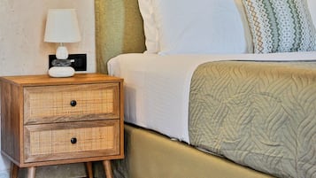 1 habitación, tabla de planchar con plancha y cuna de viaje