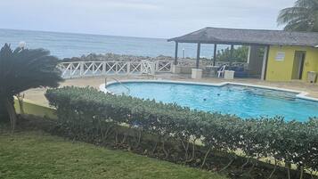 Outdoor pool, pool umbrellas, pool loungers