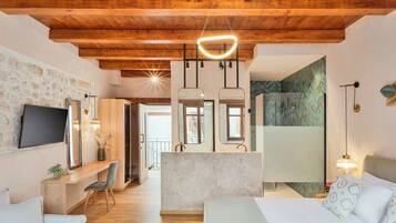 1 habitación, tabla de planchar con plancha y cuna de viaje