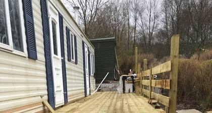 Static Caravan with Decking porch, Quiet and Remote, with car parking.