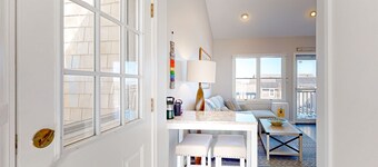 Two-story condo with ocean views, parking, & private balcony
