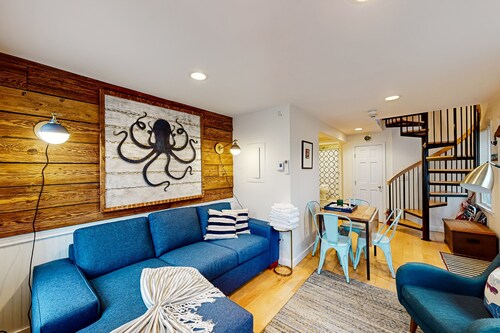 Updated condo with ocean view, viewing deck, & private W/D