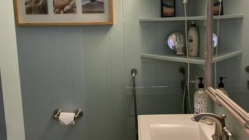 Hair dryer, bidet, towels, soap