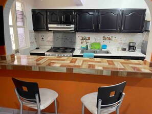 Private kitchen - Alojamiento Vacacional Casa Canoa 138 (La Paz)