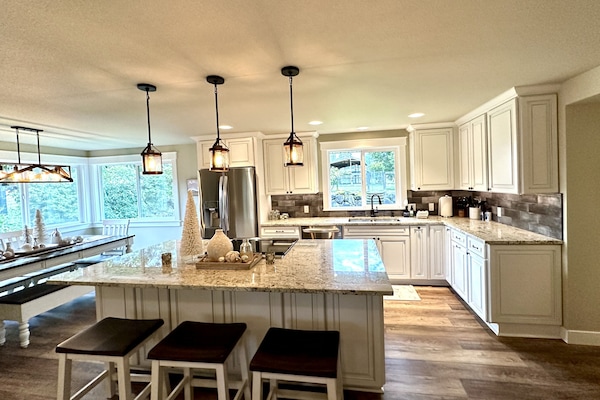 Island in Kitchen provides plenty of prep area plus stools to hangout!