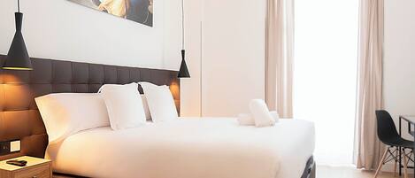 Family Suite, Balcony | In-room safe, desk, laptop workspace, blackout drapes