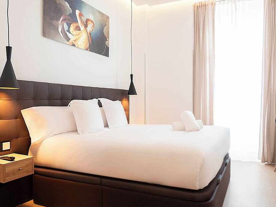 Family Suite, Balcony | In-room safe, desk, laptop workspace, blackout drapes