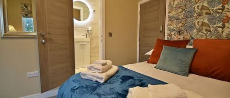 1 bedroom, desk, iron/ironing board, travel cot