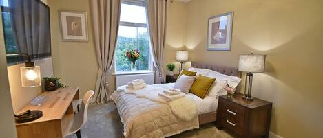 1 bedroom, desk, iron/ironing board, travel cot