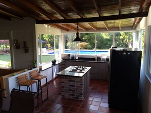 Fridge, microwave, stovetop, coffee/tea maker