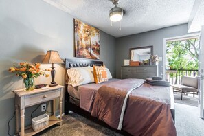 1 bedroom, desk, iron/ironing board, travel crib