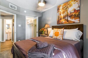 1 bedroom, desk, iron/ironing board, travel crib