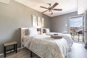 1 bedroom, desk, iron/ironing board, travel crib