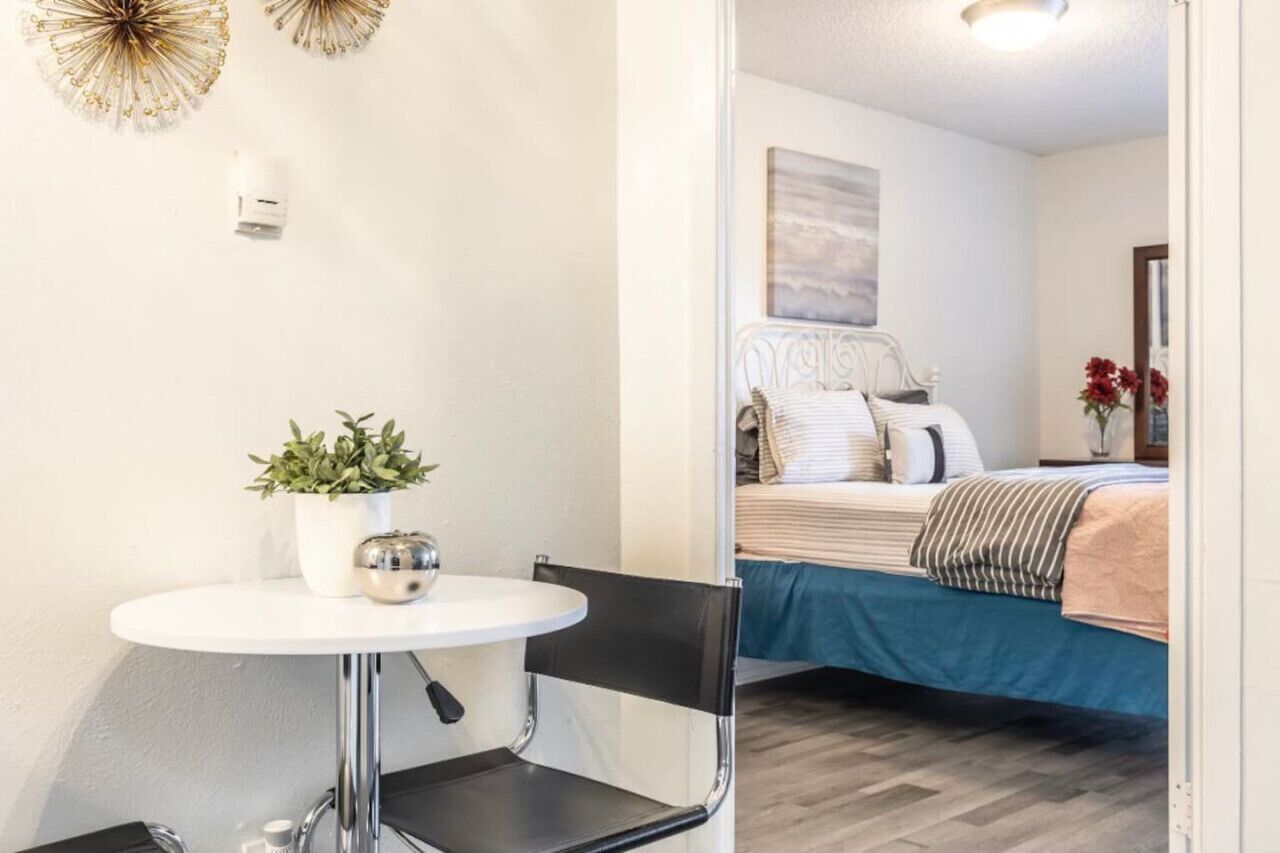 1 bedroom, desk, iron/ironing board, travel crib