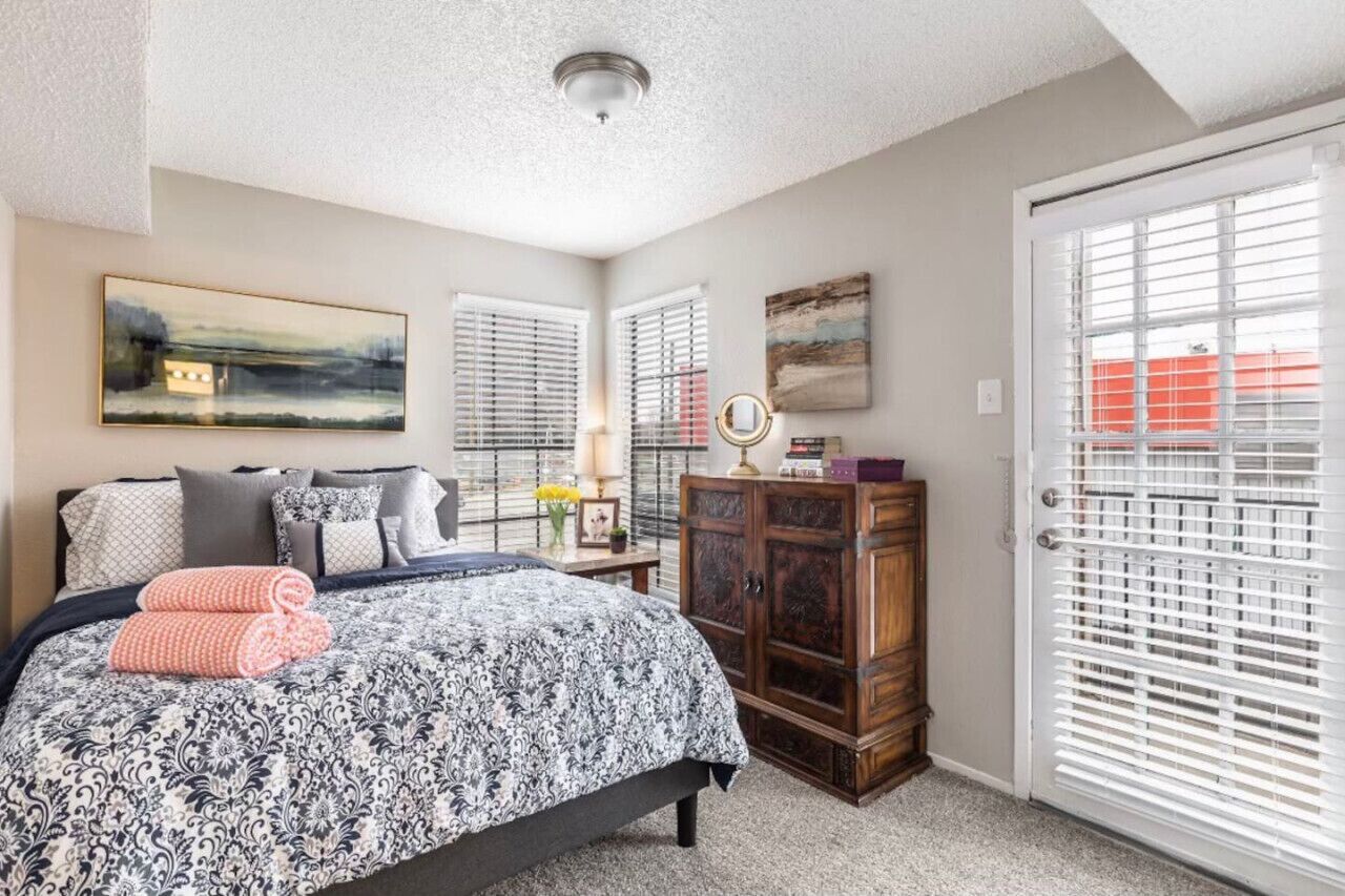 1 bedroom, desk, iron/ironing board, travel crib