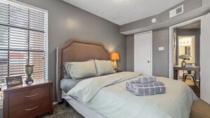 1 bedroom, desk, iron/ironing board, travel crib