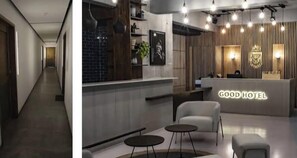 A hotel lobby with a reception desk, a seating area with two chairs and a small table, and a corridor leading to other rooms. - Cozy penthouse with a hot tub and an amazing view. 15 minutes from the airport. (Guatemala City)