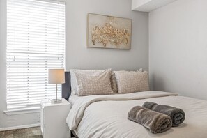 1 bedroom, desk, iron/ironing board, travel cot