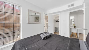 1 bedroom, desk, iron/ironing board, travel crib