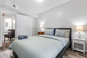 1 bedroom, desk, iron/ironing board, travel crib