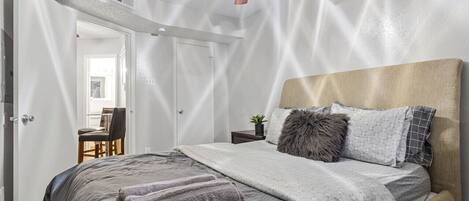 1 bedroom, desk, iron/ironing board, travel cot