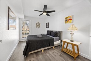 1 bedroom, desk, iron/ironing board, travel crib