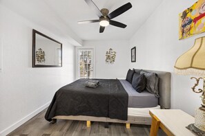 1 bedroom, desk, iron/ironing board, travel crib
