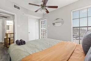 1 bedroom, desk, iron/ironing board, travel crib