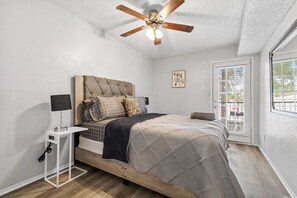 1 bedroom, desk, iron/ironing board, travel crib