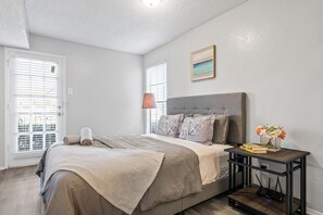 1 bedroom, desk, iron/ironing board, travel cot