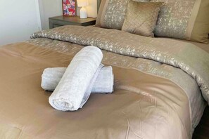 1 bedroom, desk, iron/ironing board, travel cot