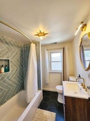 Hair dryer, towels, soap, shampoo