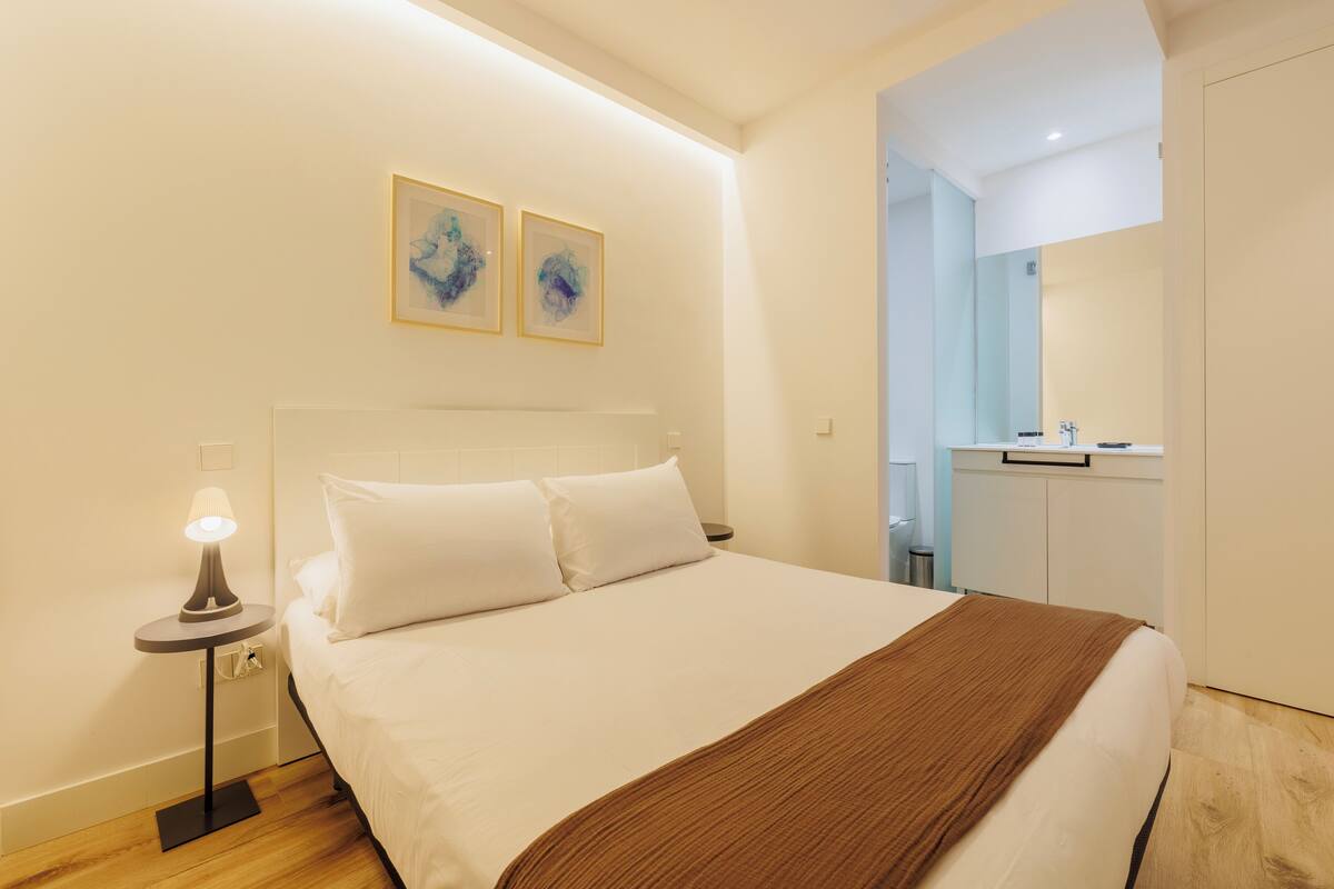 Premium bedding, iron/ironing board, WiFi (free), bed sheets